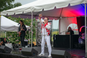 Male singer singing at microphone