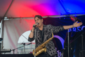 Male singer singing at microphone