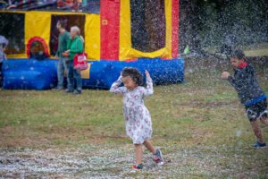Little girl playing in snowflakes
