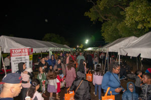 Crowd of shoppers at winter fest open air market